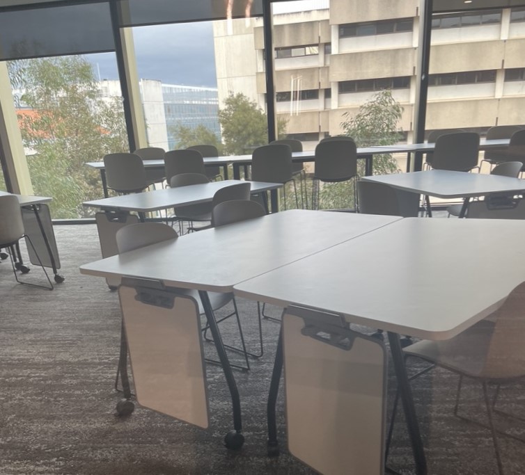 classroom with tables and chairs